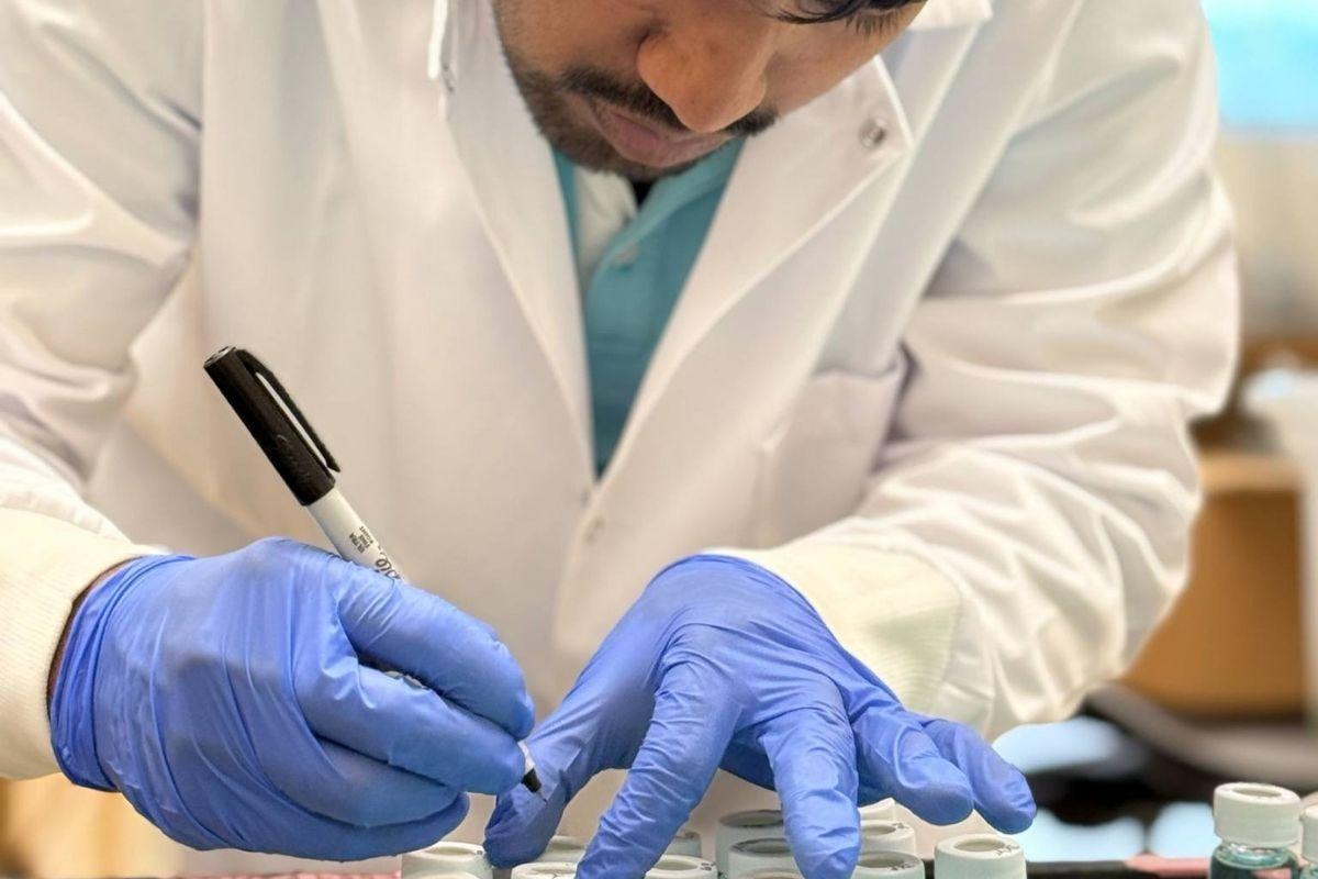 Binaya with his lab work
