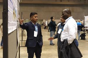 Deepak explaining his research at Asa, CSSA, SSSA Meeting 2023