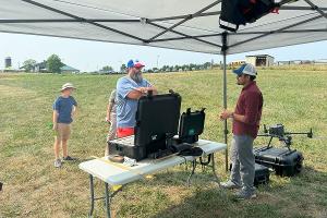 Suraj explaining about the drones and sesnors in Feild day 2024