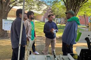 Agronomy lab explaning about their equipments for crop monitoring