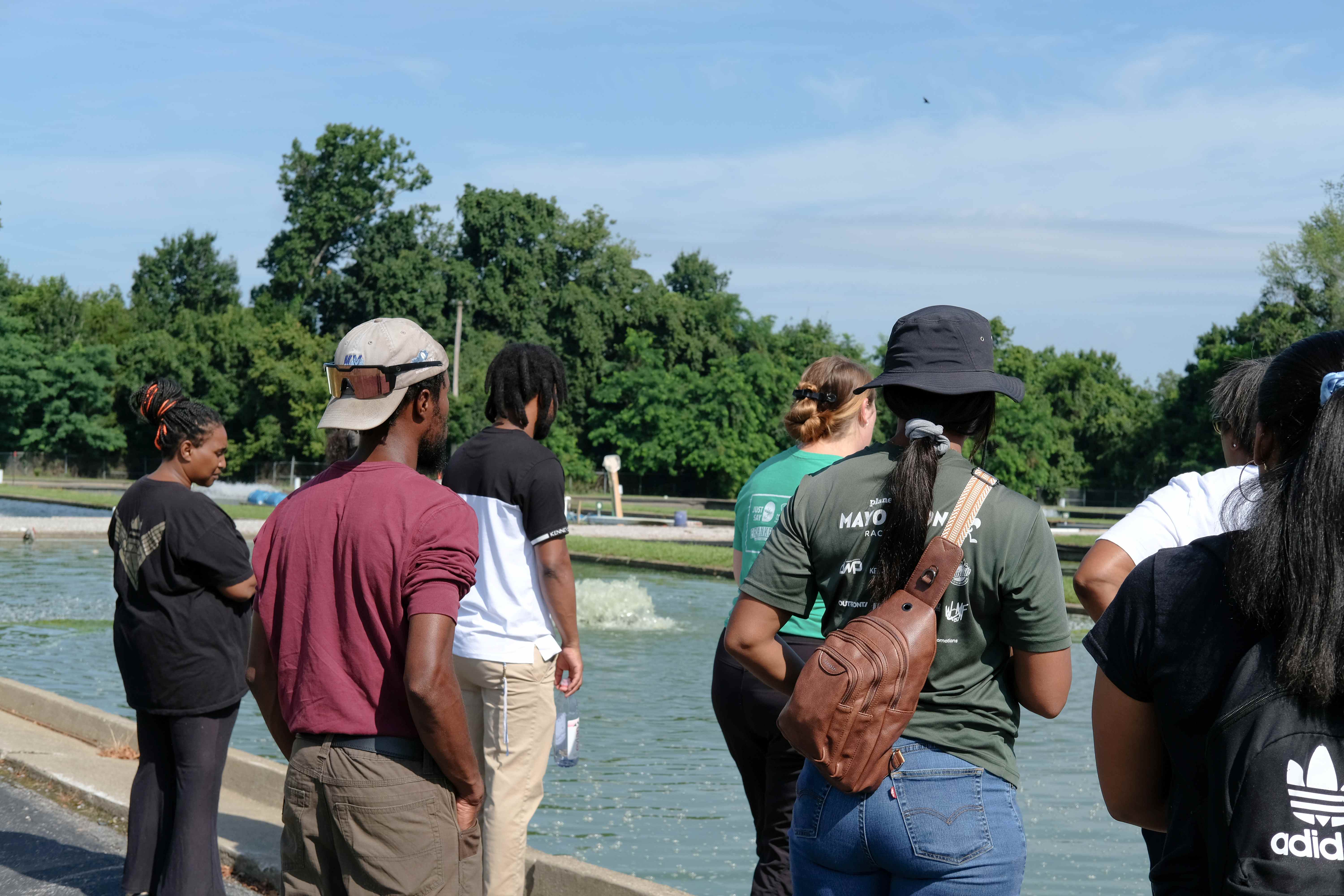 Participants look out over KSU's aquaculture ponds.