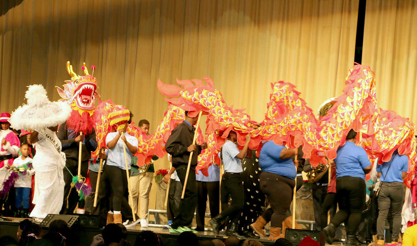 KSU Cultural Fest with students portraying a dragon on stage